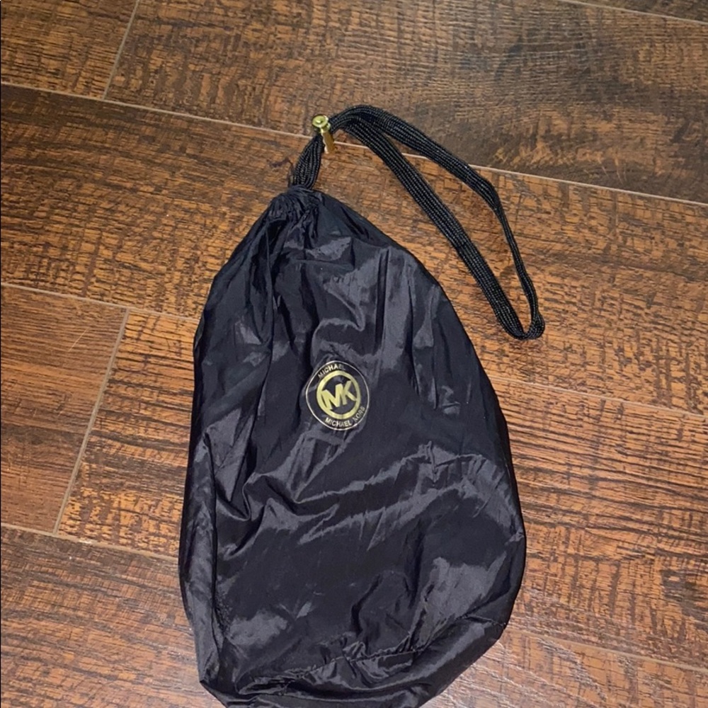 A Michael Kors puffer jacket bag